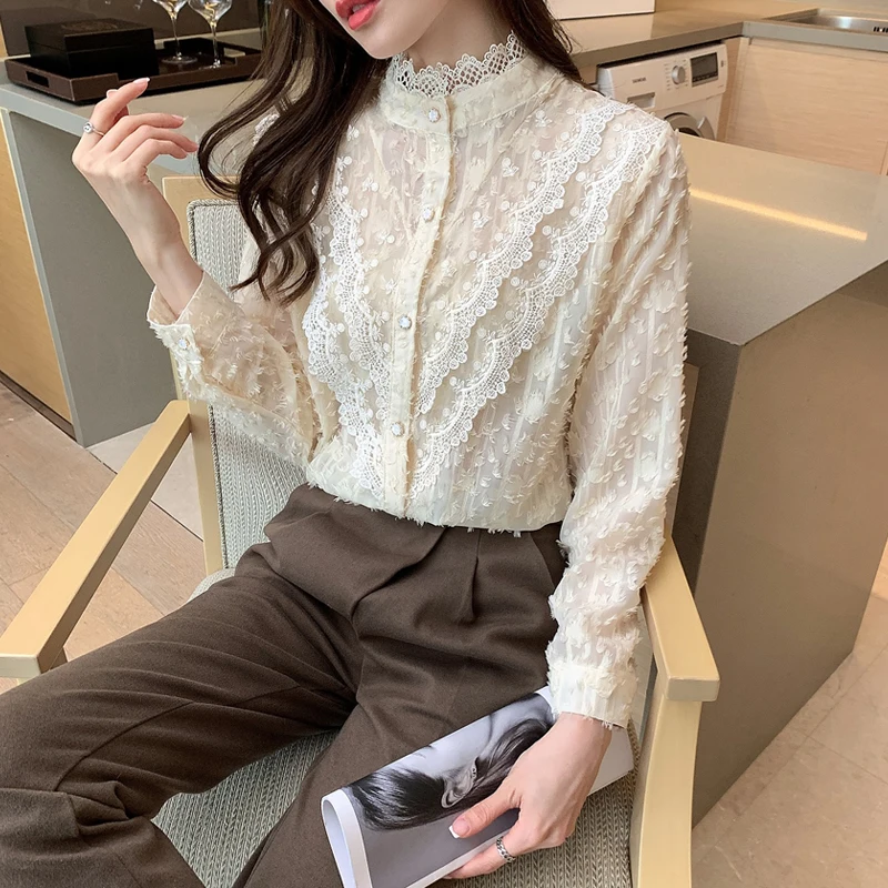 

2021 New Stand Collar Hollow Crochet Lace Patchwork Top Early Spring Lace Blouse Women Sweet Buttons Tassel Chiffon Shirt 13408