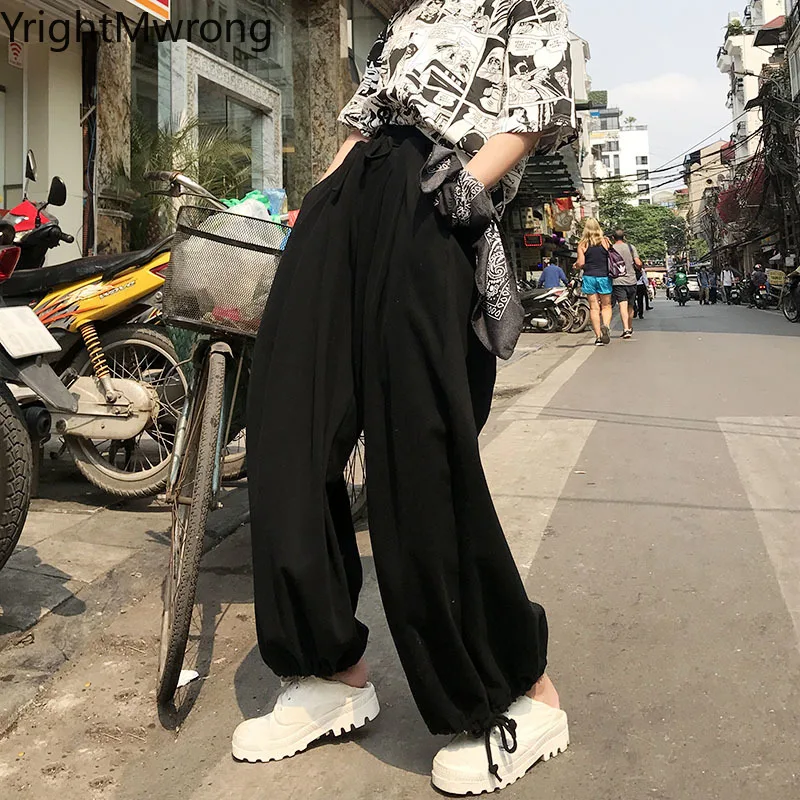 Брюки джоггеры женские с широкими штанинами однотонные мешковатые шаровары