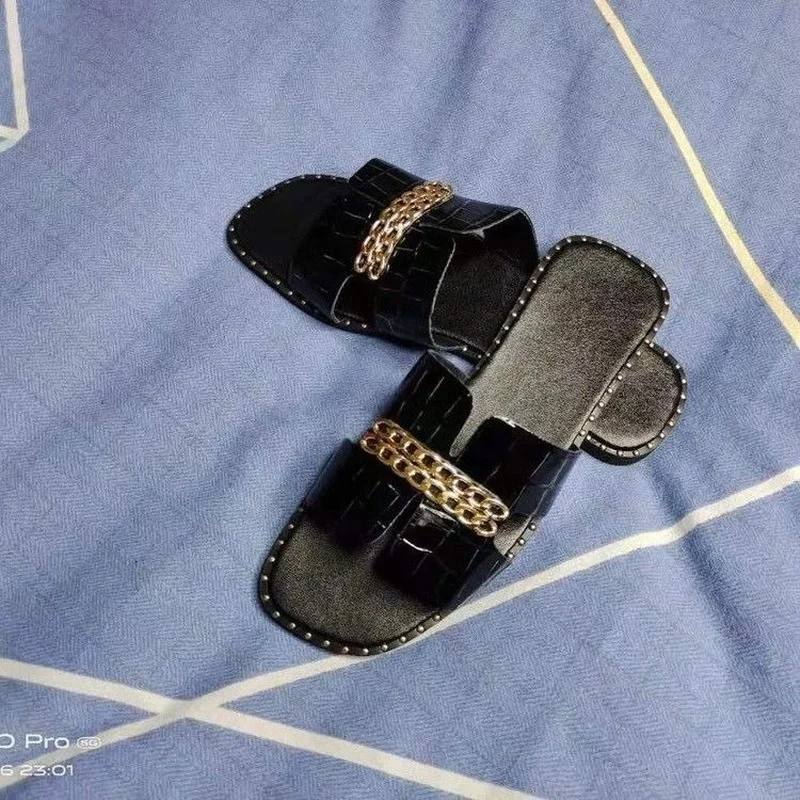

Slippers female summer wear female Rivet metal chain flat bottom
