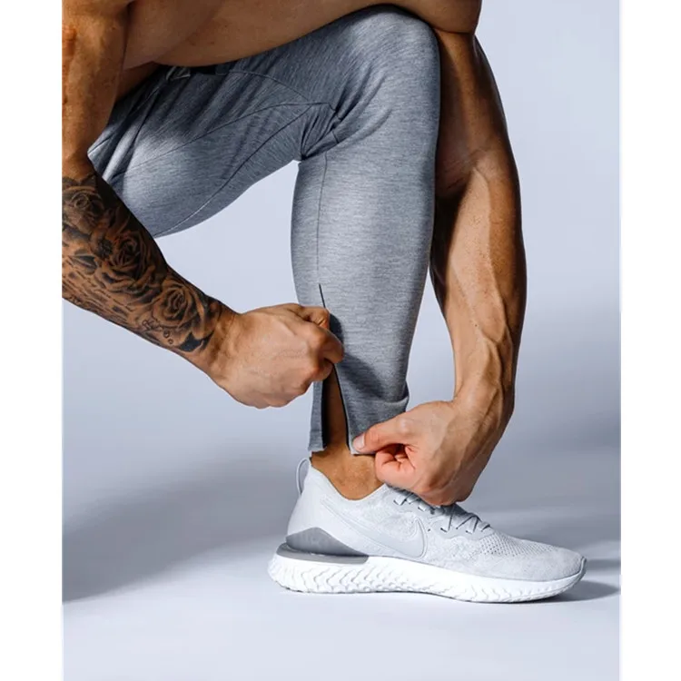 

Brand Joggers Men Fitness Bodybuilding Pants Pantalones Hombre stacked Sweatpants Sports Trousers Men GYM Running Pants Men 3XL