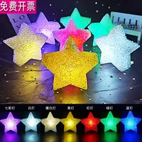 stage performance holding star lights in hand dancing performance chorus holding luminous five pointed star