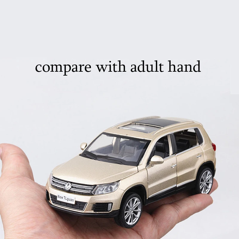 Модель литая автомобиля KIDAMI 1:32 Tiguan модель игрушечного со звуком и светом