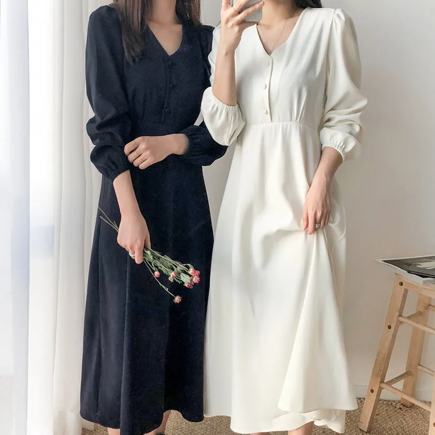 Однобортное платье с V-образным вырезом тонкой талией и плиссированной юбкой |