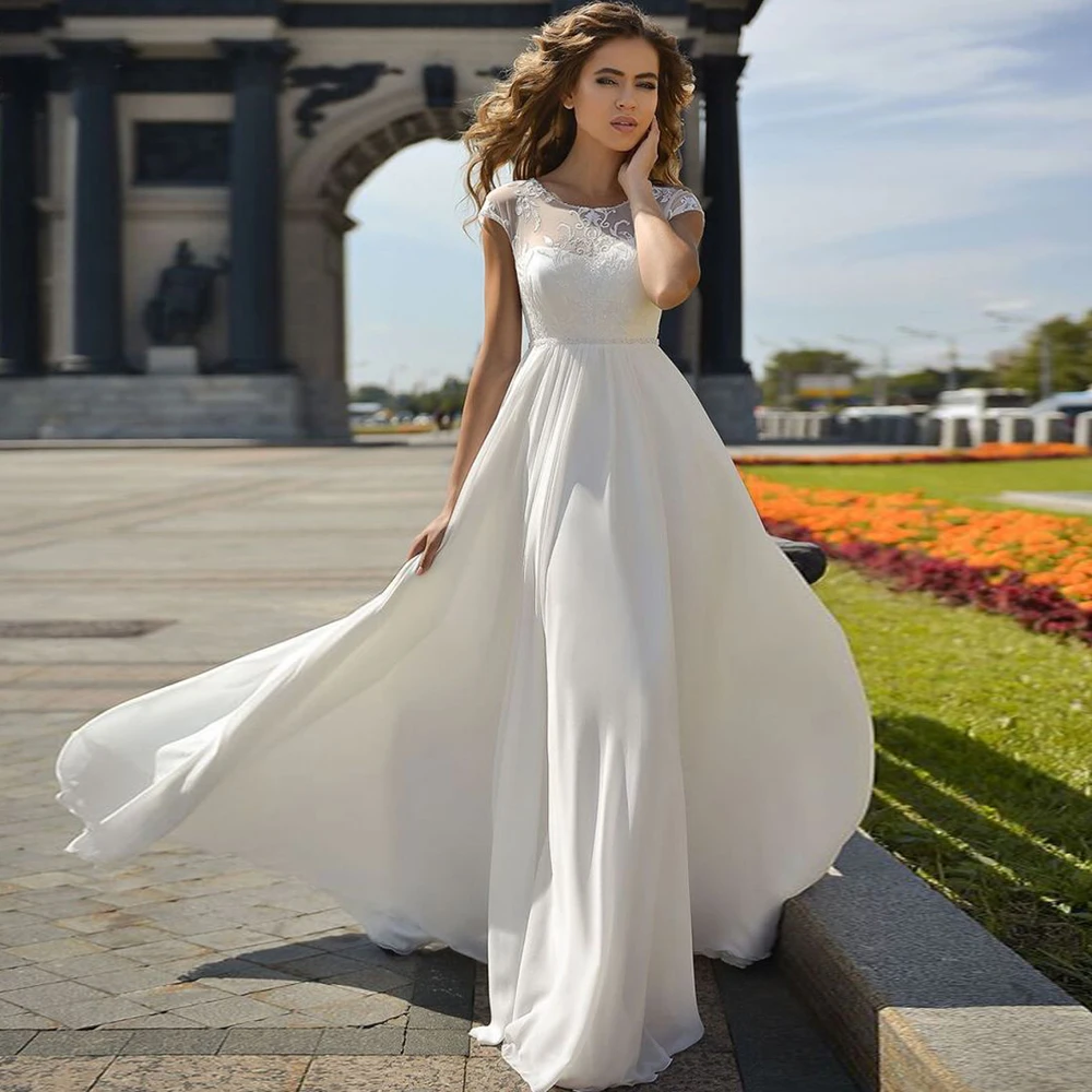 

2021 Elegant A-Line Wedding Dresses O-Neck Cap Sleeve Lace Appliques Beading Backless Floor Length Chiffon Bride Gown