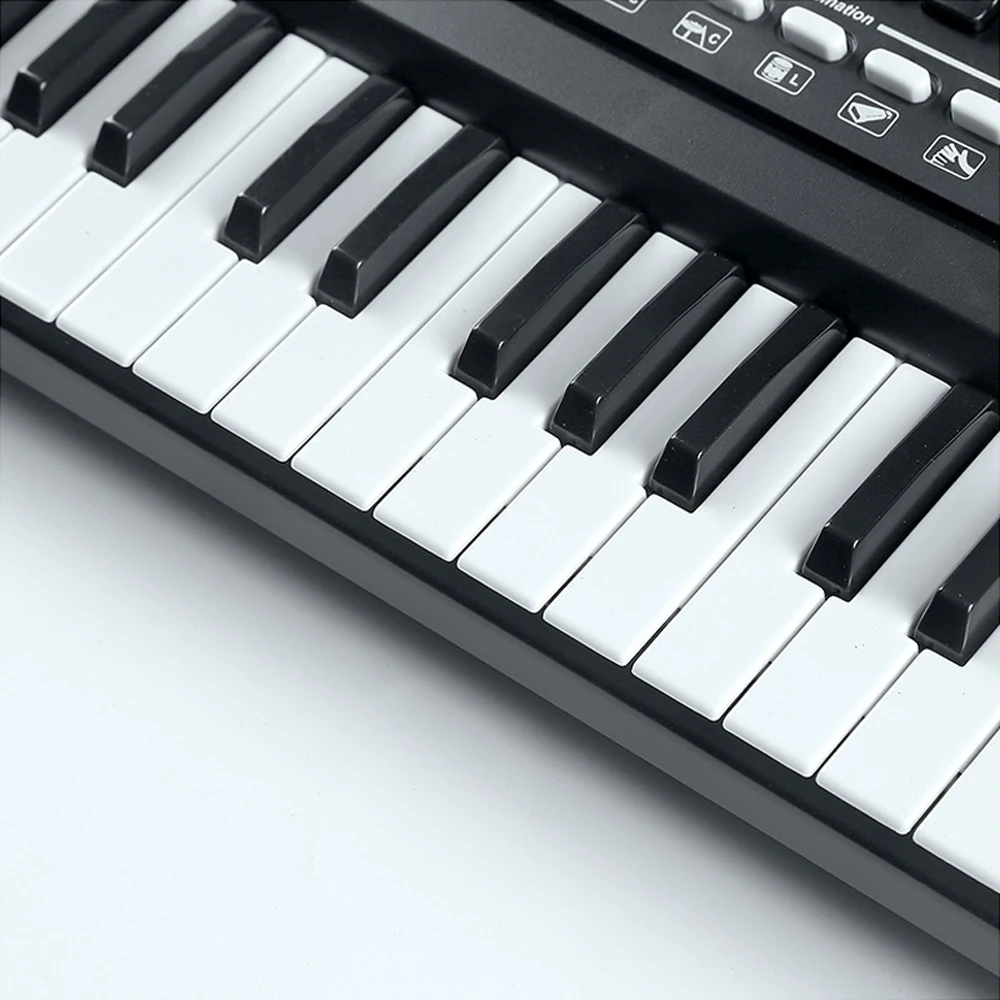 

61 Keys Digital Music Electronic Keyboard Piano Multifunctional Electric Piano for Student with Microphone Musical Instrument