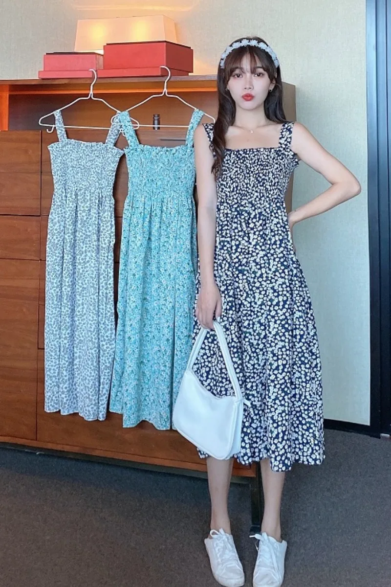 

Dress 2021 spring and summer new Korean version of the French retro floral suspender skirt high-waisted thin mid-length skirt