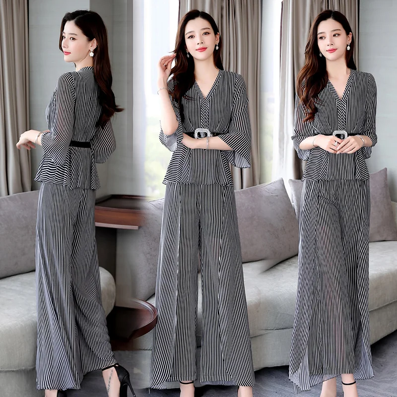 Женский костюм из двух предметов блузка в полоску и брюки с широкими штанинами