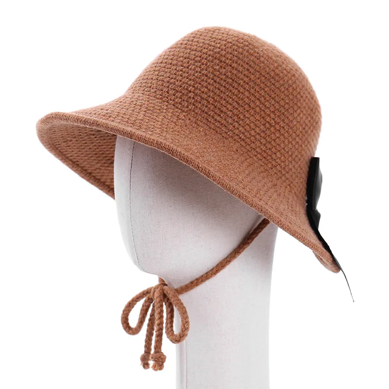 

New winter warm wool knitting fisherman hat ms han edition pure color hat bowknot basin of windproof cap