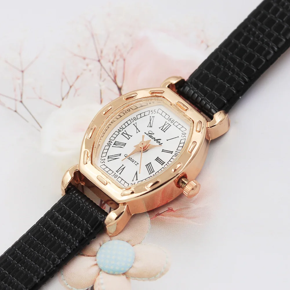 

Nice PopRoman Scale barrel-shaped Female Watch Casual Fashion Trend Creative Small Square Watch Ladies Quartz Watch