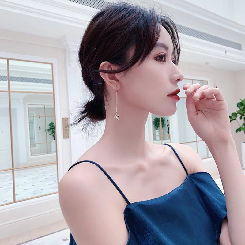 

Women Korean Long tassels metal hollow ball design fine crystal Drop earrings 2020 Classic style New earrings Jewelry
