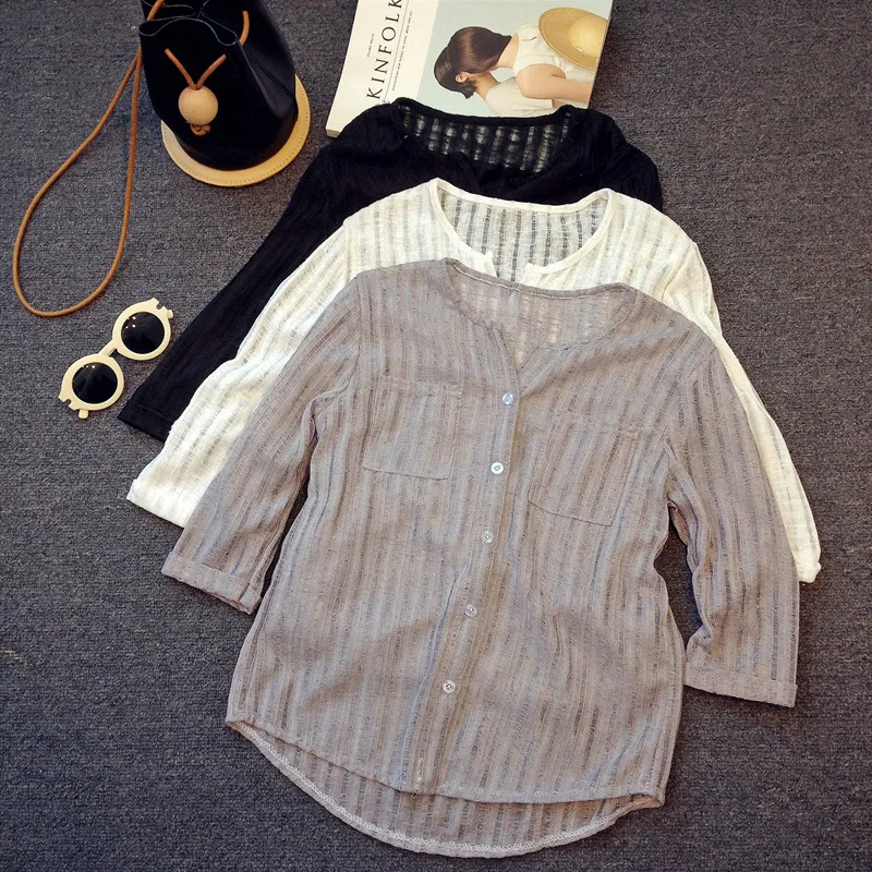 

2021 new loose V-neck top casual cotton and hemp versatile base shirt women's wear Han Fan 7-sleeve shirt women's wear