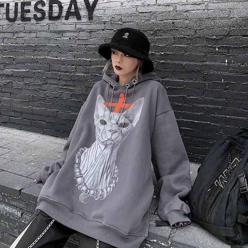 

Autumn and winter Korean version of ins dark dark wind cartoon printing loose hooded pullover plus velvet thick women's top