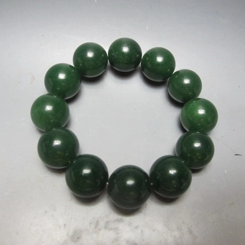 

Natural Green Hetian Jade Hand-Carved Beads Bracelet