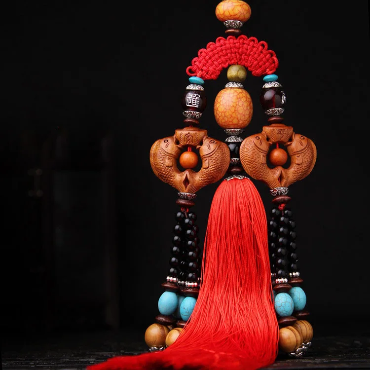 

Boutique hot car pendant concentric fish high-grade peach wood keychain car pendulum ornaments carved car hanging car