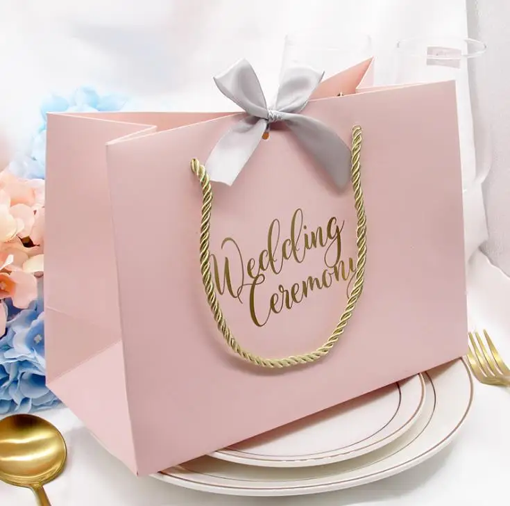 

High-quality Gifts Bow Gift Bag Portable Paper Bag Wedding Supplies Tote Bag Wrapping Paper Bags with Handle Wholesale
