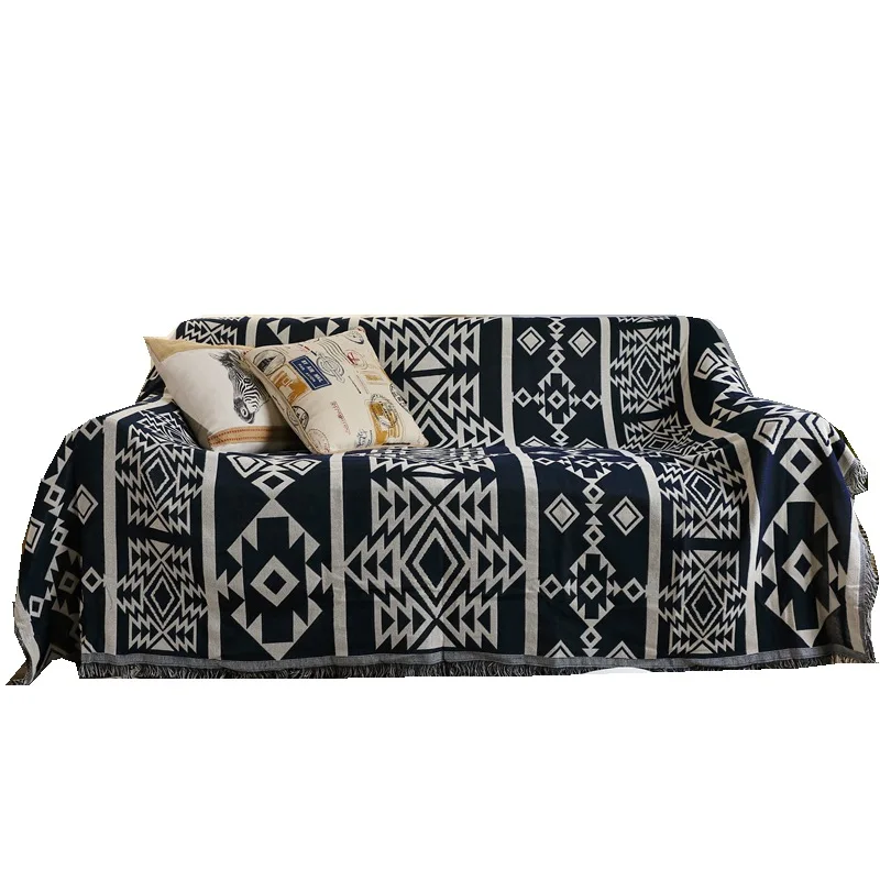 Двустороннее одеяло в стиле бохо с геометрическим рисунком для дивана