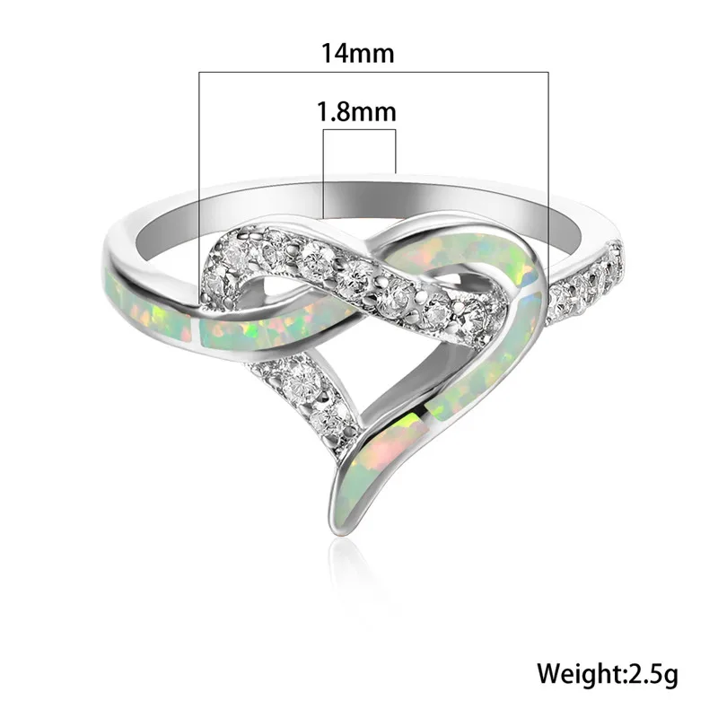 Кольцо женское обручальное с голубым и белым огненным опалом серебристого цвета