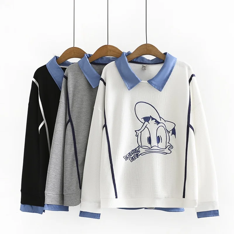 

Fake two-piece gray sweater women's tide 2021 autumn new loose Korean cartoon embroidered blouse female jacket