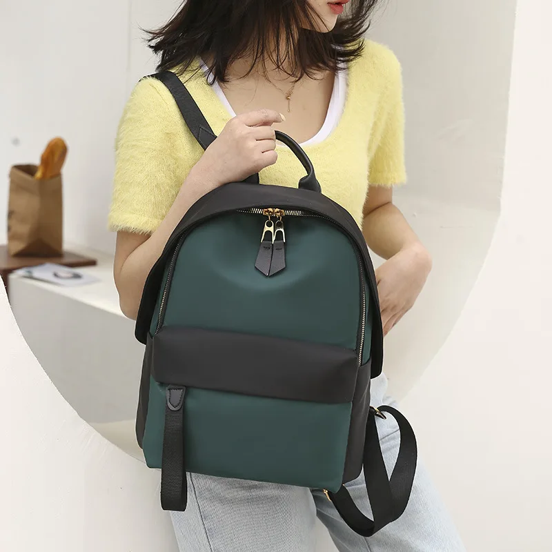 

2021 New Oxford Cloth Unisex Backpack Female Bulk Travel Women's Bag Street Fashion Zipper Designer Backpack A211