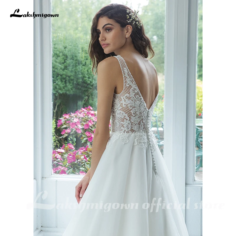 

Vintage Lace Beads Wedding Dress 2021 Deep V-neck Bridal Gown Trouwjurk Mariage Wedding Gown Tulle Beach Wedding Dresses