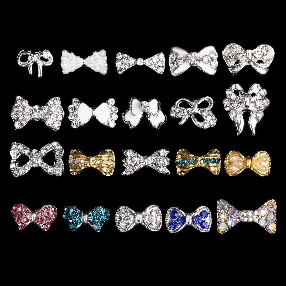 

100PCS Nail Rhinestone Alloy Nail Accessory Studs Clear Bow Crystal Pearl Bow Nail Charms Nail Jewelry, more than 100designs 1