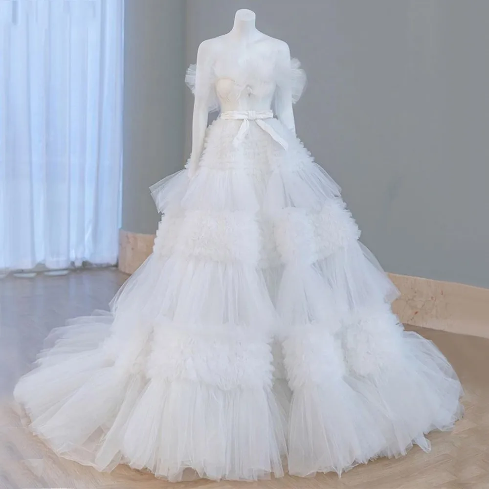 

Arabic Bridal Dresses Off Shoulder Sleeveless Vestido De Noiva Ruffles Tiered Tulle Puffy Wedding Gowns White Backless