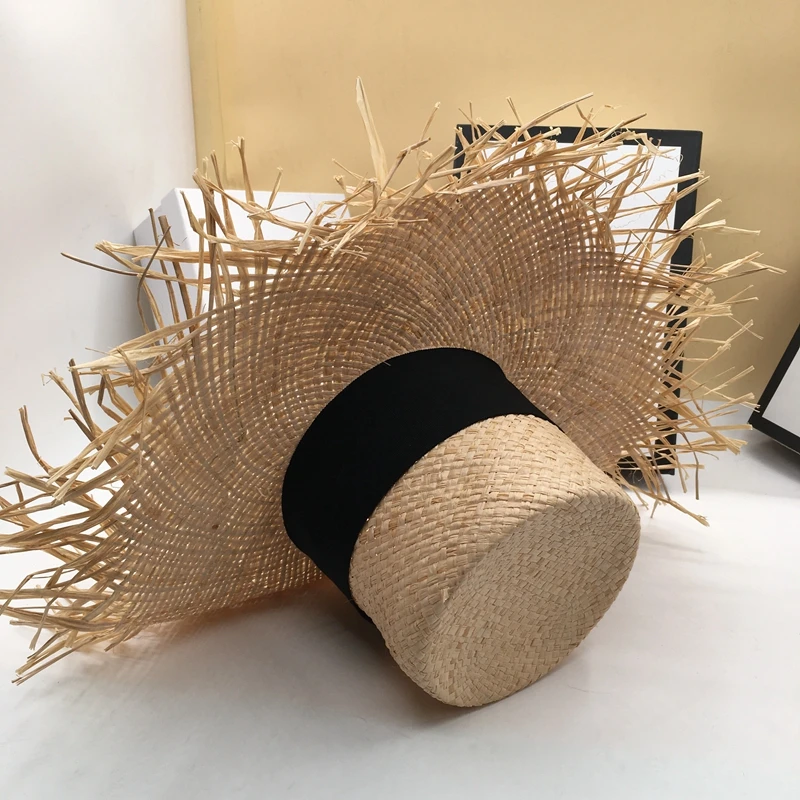 The new sun hat burrs thin section lafite grass is prevented bask in large straw hat brim gao tou2 flat hat for a holiday