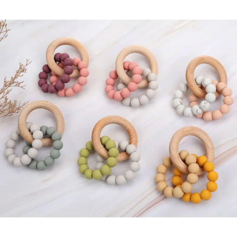 

Baby Teether Baby Gym Rattle Toy Natural Wood & BPA-Free Silicone Beads Teething Ring Chew Toy