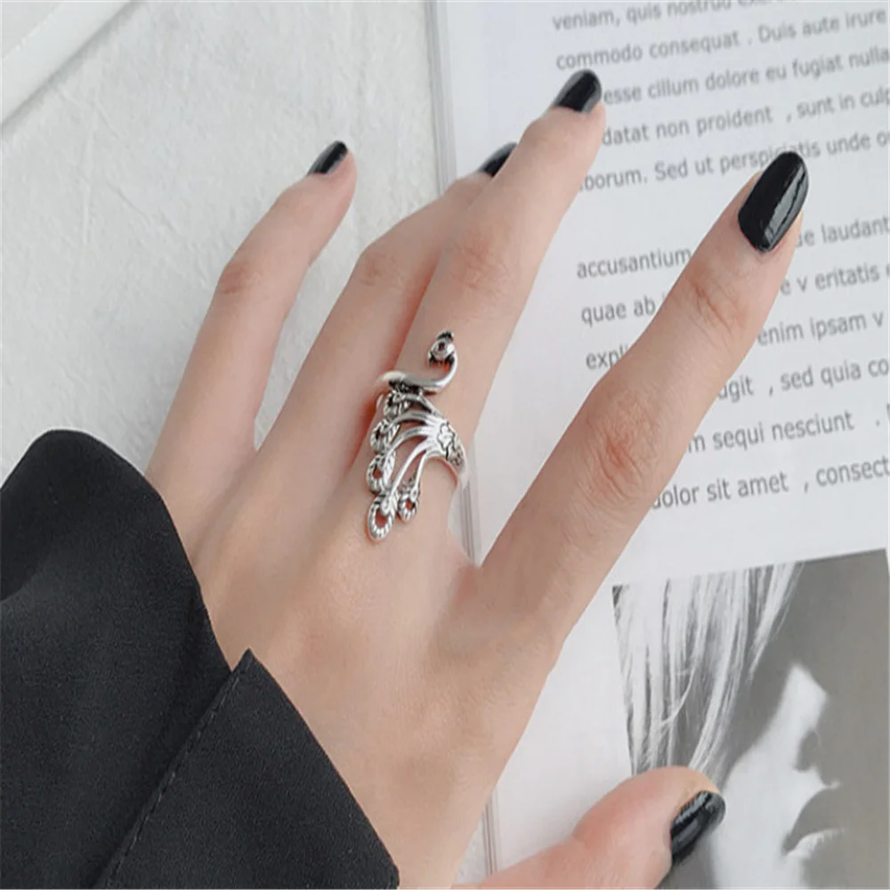

Peacock Koi Ring, Ring Hook, Open Needle and Thread Artifact