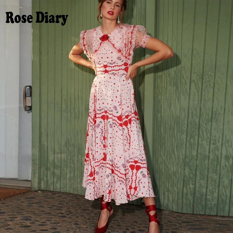 Модельные дизайнерские розовые цветочные платья-трапеции с принтом в виде