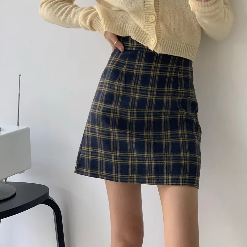 

plaid skirt Early spring 2021 new Korean version of Hong Kong-style plaid bag hip skirt high waist A-line skirt