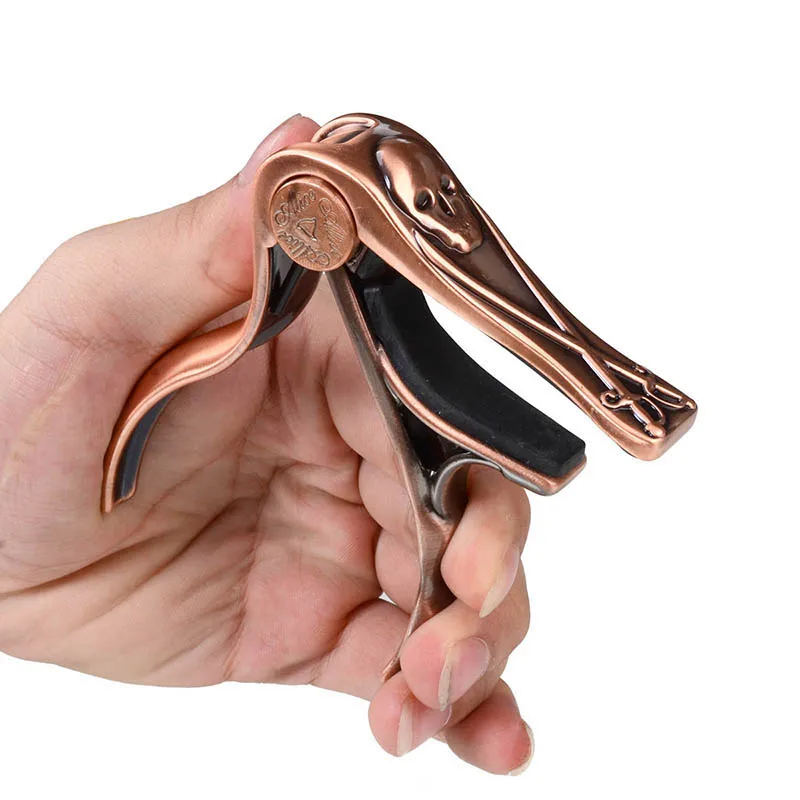 Алиса акустический каподастр Бронзовый A007H быстросменный триггерный ключ Череп