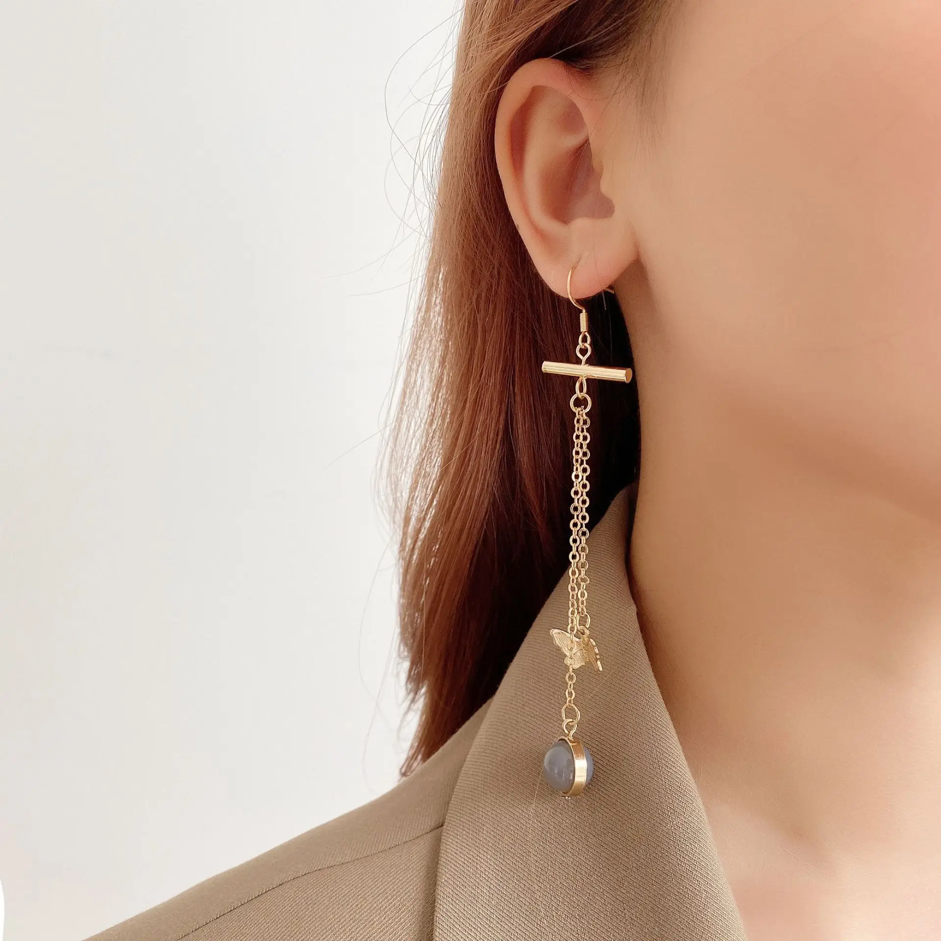 

South Korea Fashion Temperament Elegant Long Tassels Bowknot Earring Senior Creative Sense Joker Inlaid Stone Ear Clip Earrings