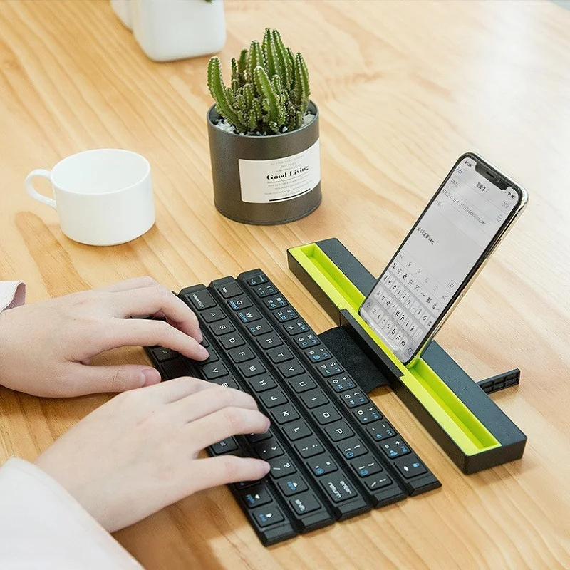 

Ultra Thin Folding Bluetooth Keyboard For Android Tablet Mobile Phone Mini Wireless For IPADTABLET Mobile Phone Stand