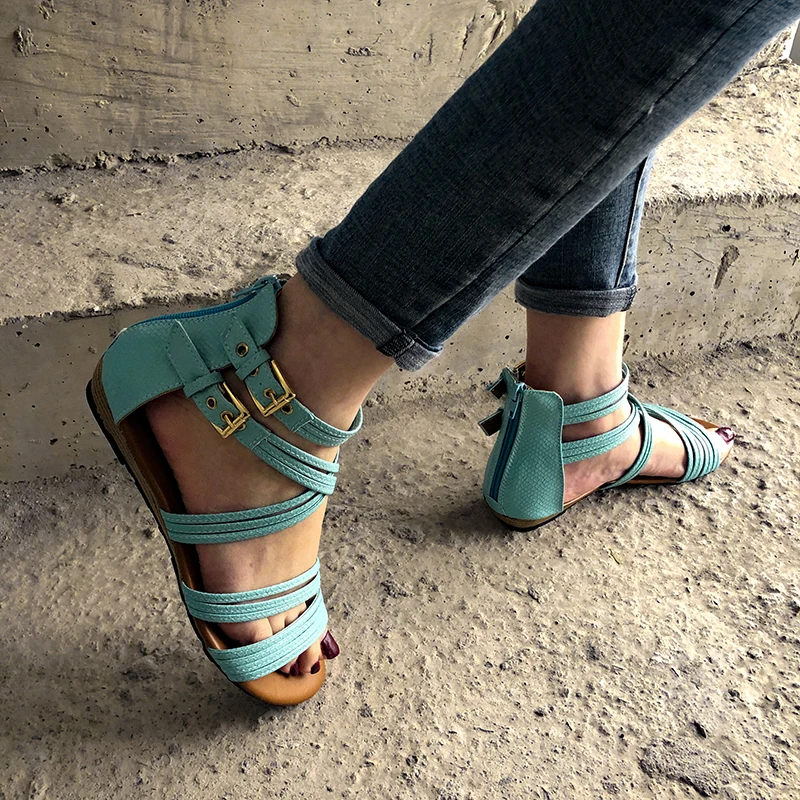 

Foreign trade large size bohemian flat-heeled cross-patterned leather covered metal buckle sandals