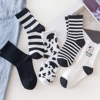 1 pair of personality cartoon black and white cow striped socks black versatile sports female socks
