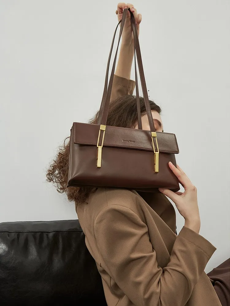 

Cowhide high-grade feeling bag versatile one shoulder women's bag minority hand-held postman's bag