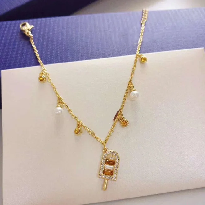 Высокое качество SWA розового золота с жемчугом драгоценными камнями и мороженое