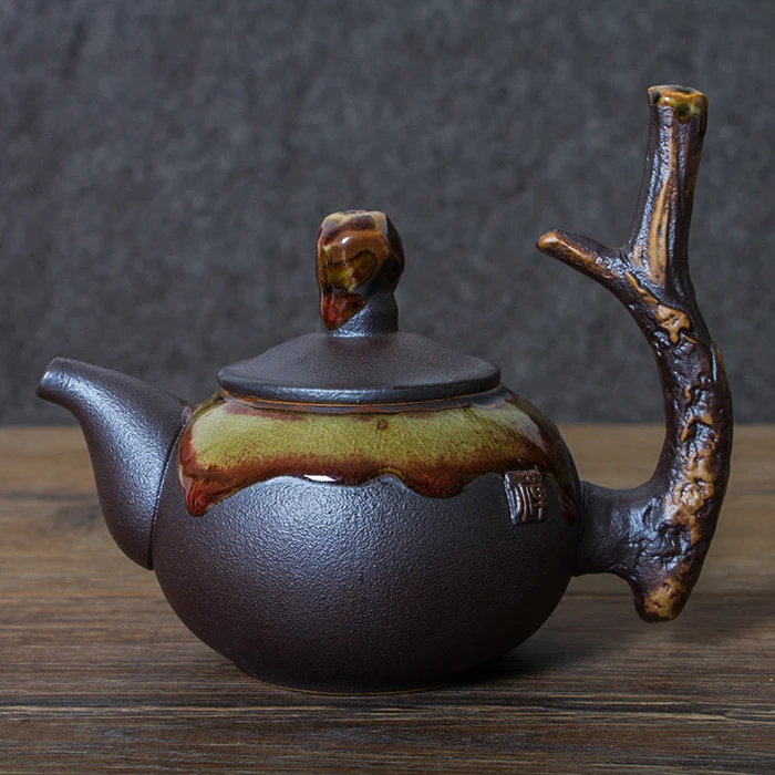 

Японский заварочный чайник ручной работы из грубой керамики восстанавливает столовую посуду для заваривания чая, кожа, античная боковая пе...