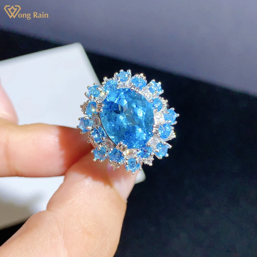 

Wong Rain, 100% 925 пробы, серебро, овальный вырез, натуральный голубой топаз, создан моиссанит, драгоценный камень, обручальное кольцо для женщин, ю...