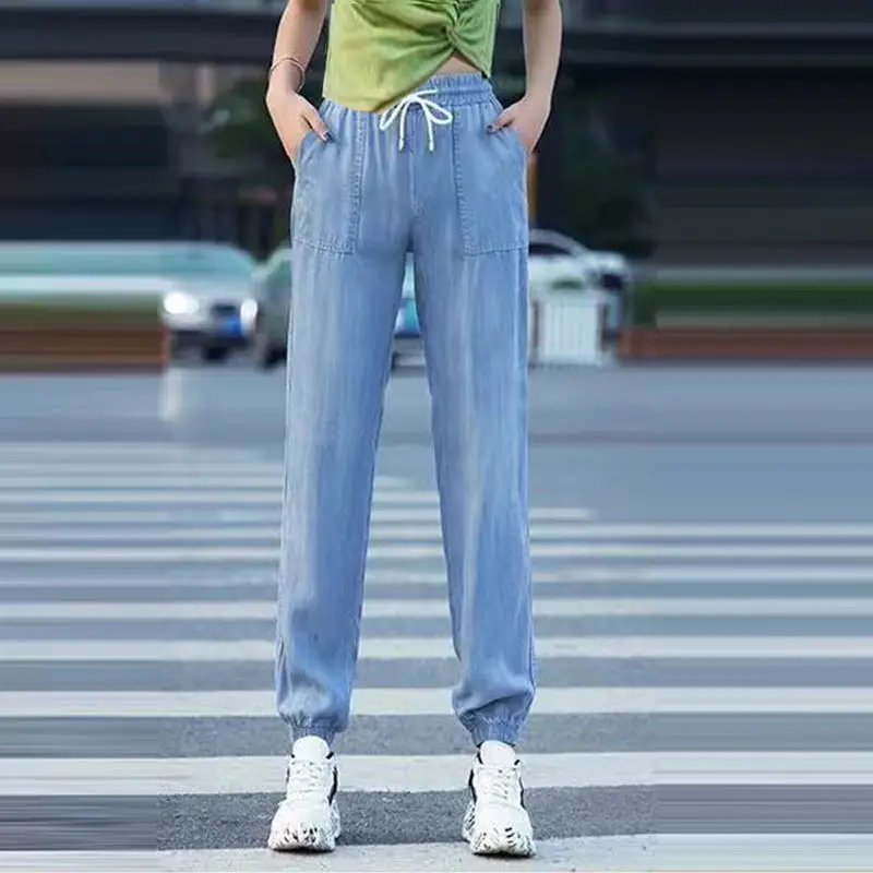 

2022 Summer New Elastic High Waist Thin Harem Pants Loose Slimming Casual Simple Blue Stretch Women Tie Feet Jeans Free Shipping