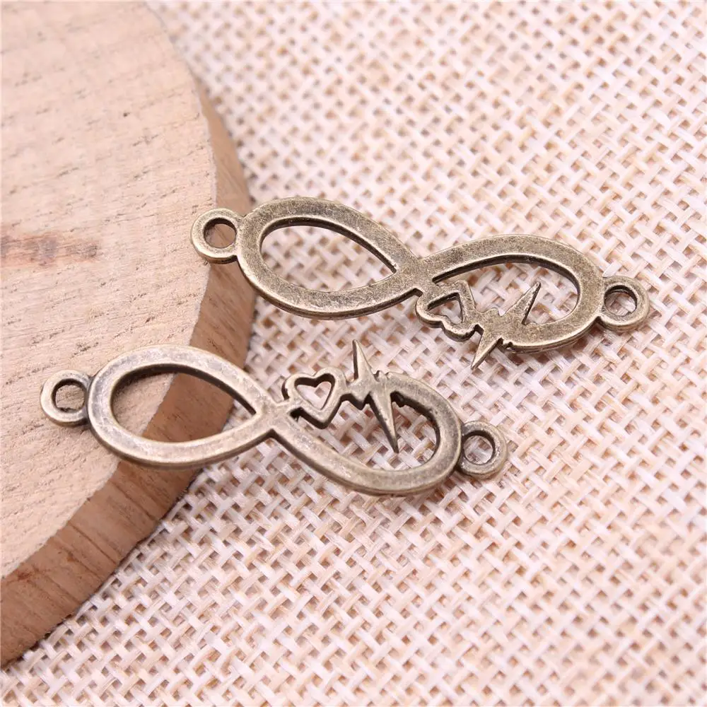 

Infinity Symbol Heart Heartbeat Connector Charms For Jewelry Making Findings Handmade Craft 10pcs Antique Bronze Color 32x11mm