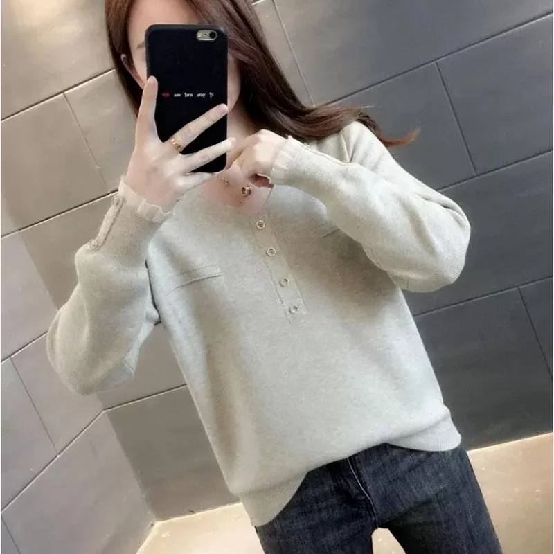 

2021 spring and autumn new style V-neck knitted tops fashionable foreign style loose temperament sweater women all-match casual