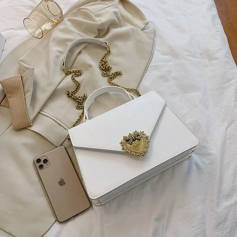 

Новинка 2021, высокое качество, лидер продаж, роскошная брендовая металлическая декоративная маленькая квадратная сумка, женская модная трен...