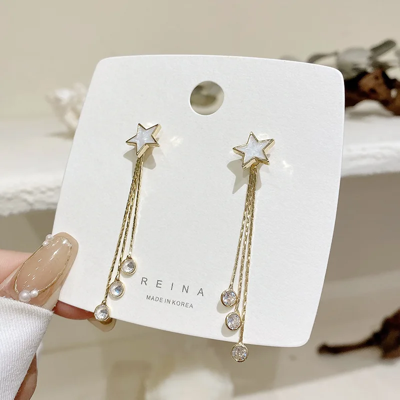 

Korean version of the fashion personality star tassel earrings female temperament long zircon earrings pendant