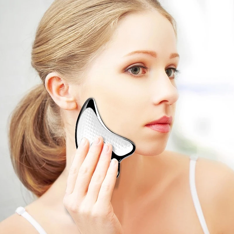 

Electric Heating Face Massager Tool Neck Guasha Micro Current Scraping Board Face Lifting Tightening Facial Massager Device