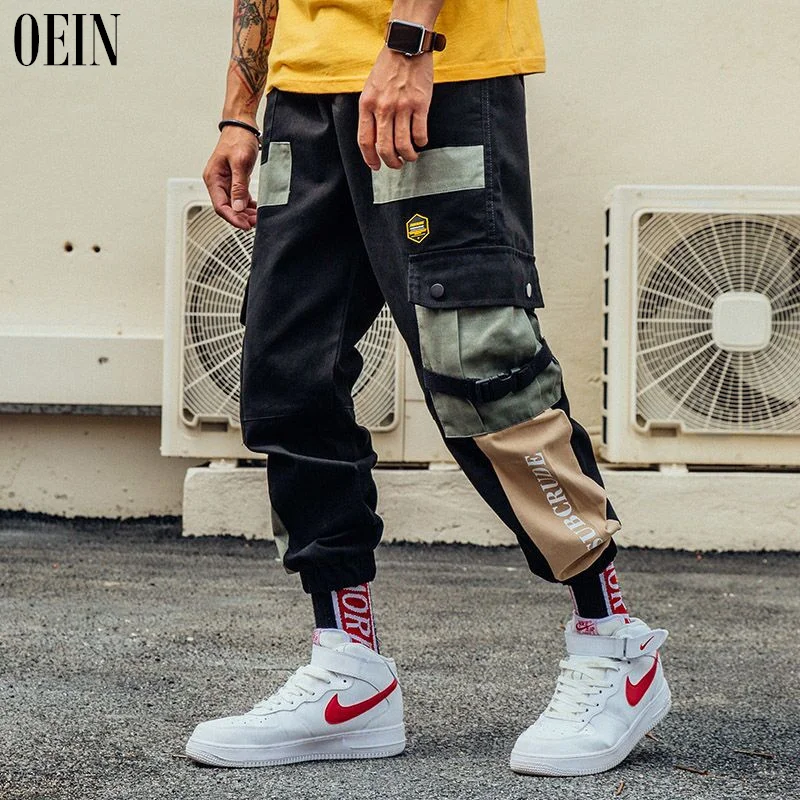 

OEIN Men's street pants New spring hip hop pants club singer stage costume trousers Ribbons streetwear joggers sweatpants