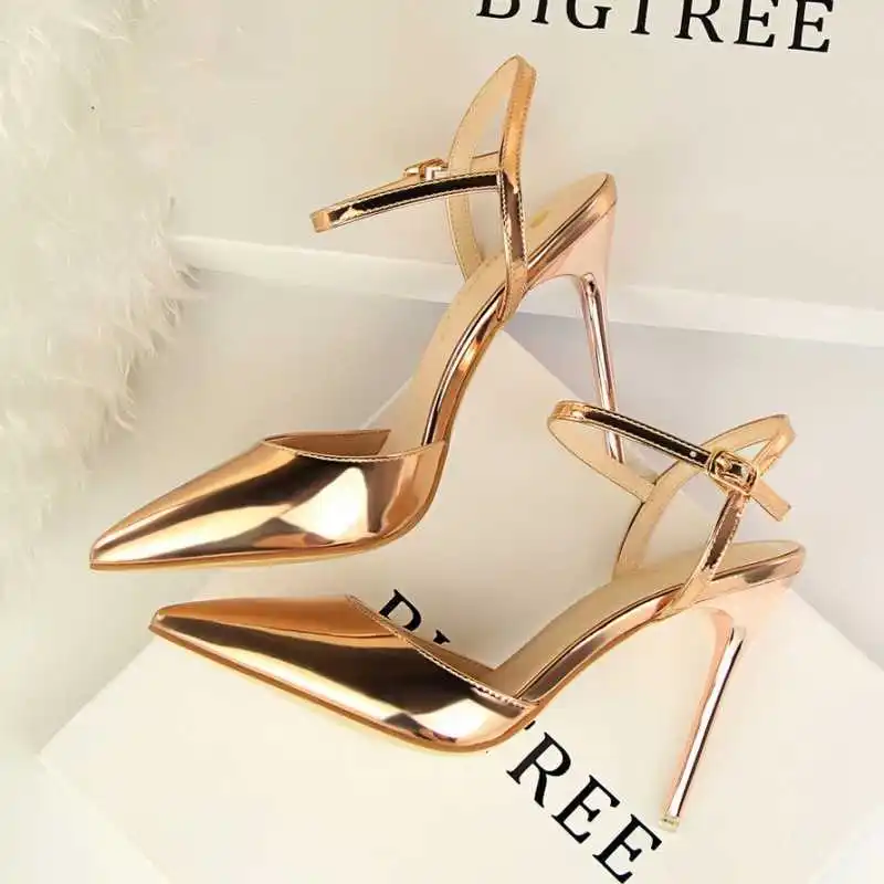 

2021 spring new pointed shoes lacquer metal sandals thin heel high heels versatile button Baotou single shoes women