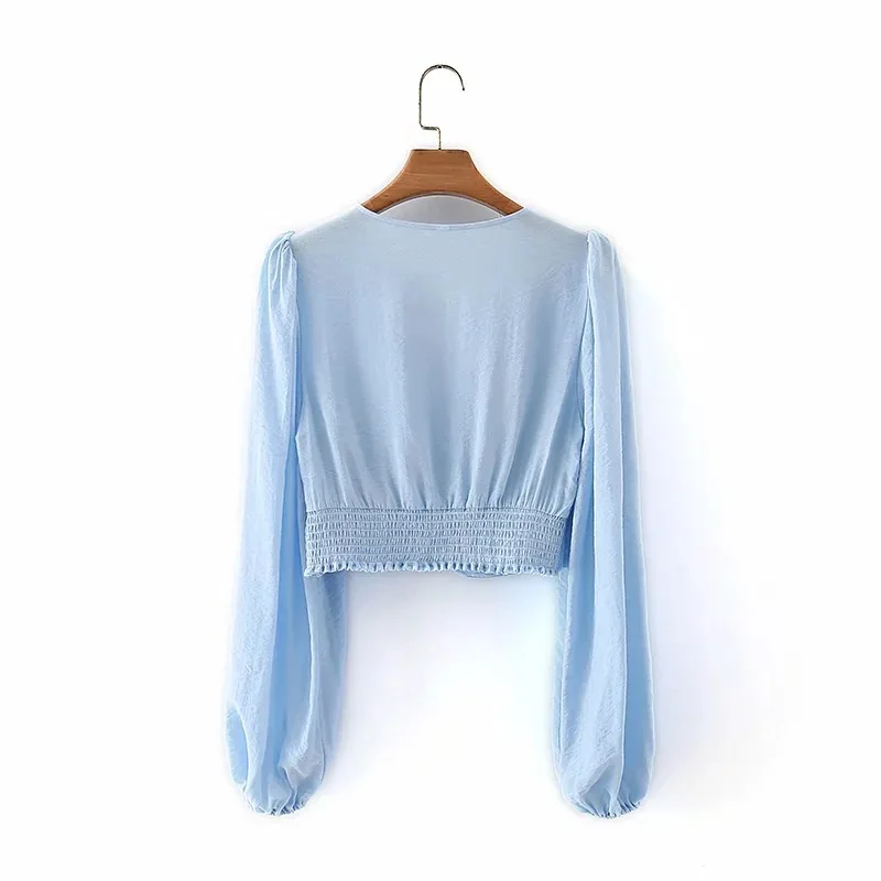 

Spring and summer new women's deep V-neck bubble sleeve navel long sleeve shirt