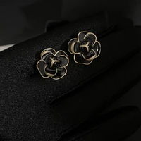 hot selling big brand clogo european and american ladies earrings brass black and white two color flower earrings fashion exquis